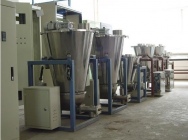 Twin screw volumetric feeders