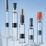 Glass and plastic syringe systems at the PDA