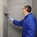 Water scavenger for silane-curing adhesives and sealants